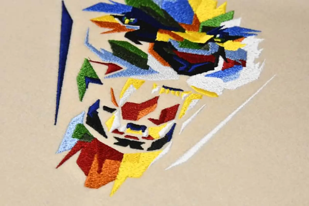 Abstraktes brüllendes Raubkatzengesicht Stick – Bild 4