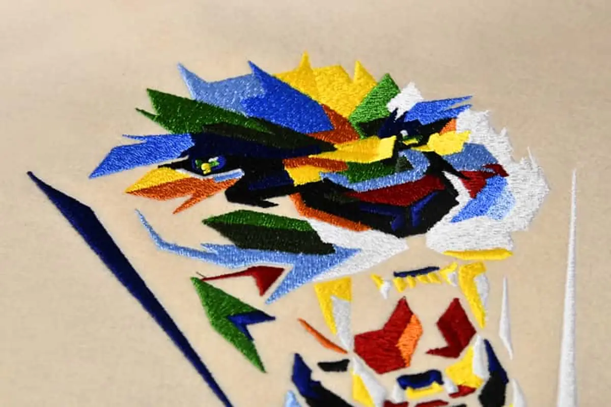 Abstraktes brüllendes Raubkatzengesicht Stick – Bild 5