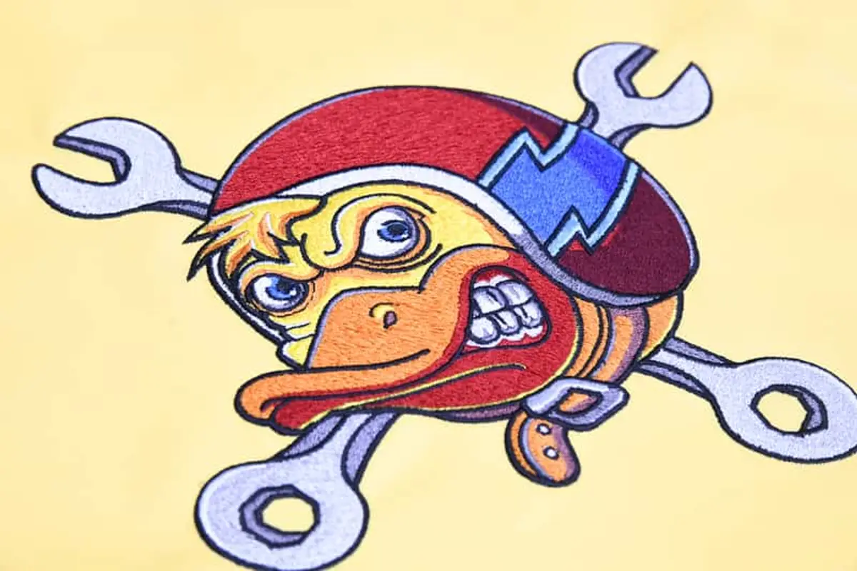 Entenkopf mit Helm & Schraubenschlüssel Stick – Bild 4